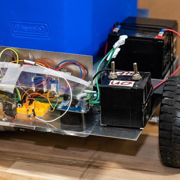 A robotic cooler, showcased at a senior engineering project day in 2019.