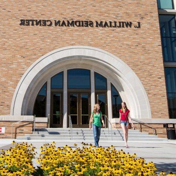 Students exit the L. William Seidman Center, home of the Seidman College of Business